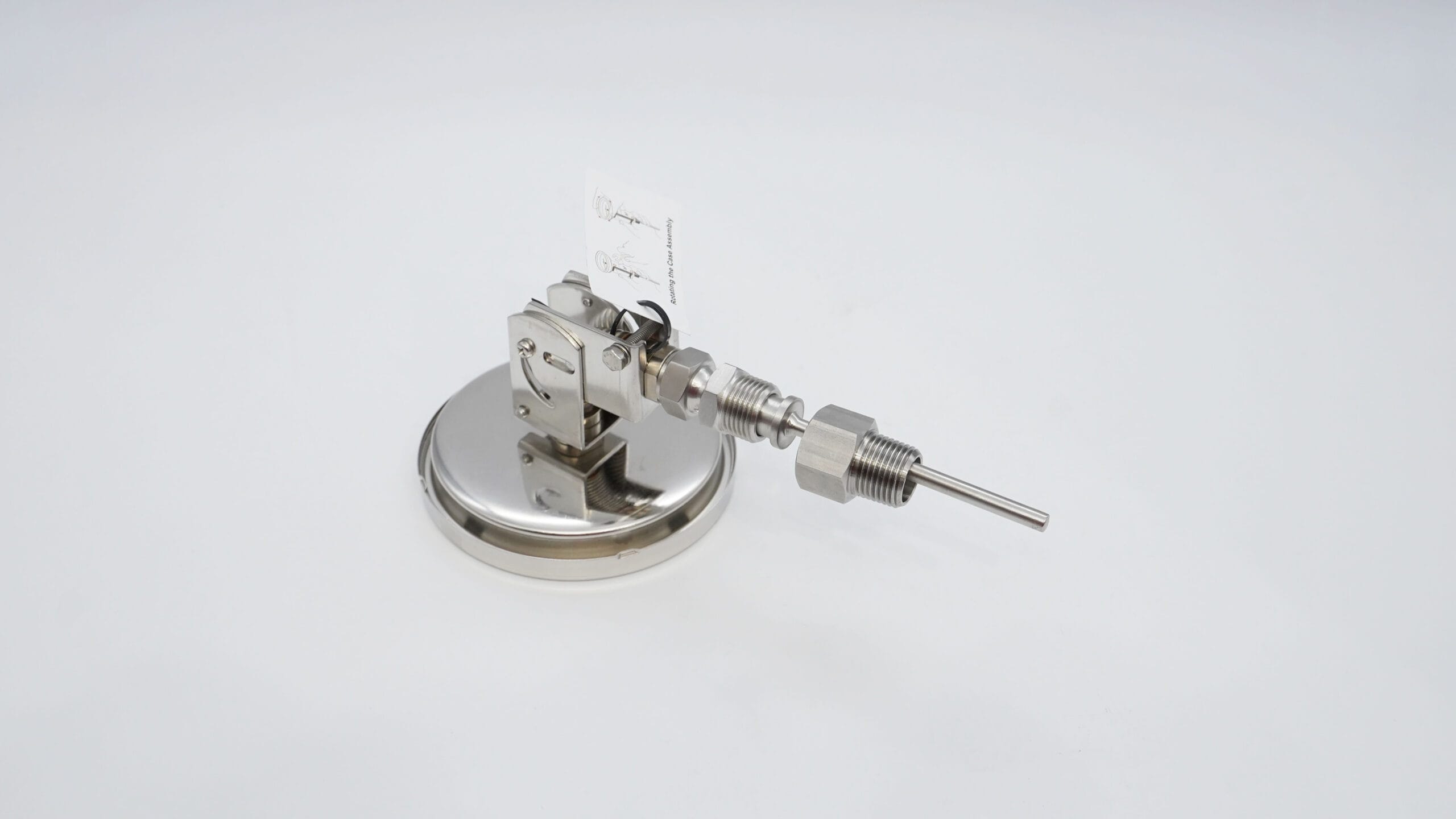Adjustable-angle thermometer showing its sensing stem and threaded connection