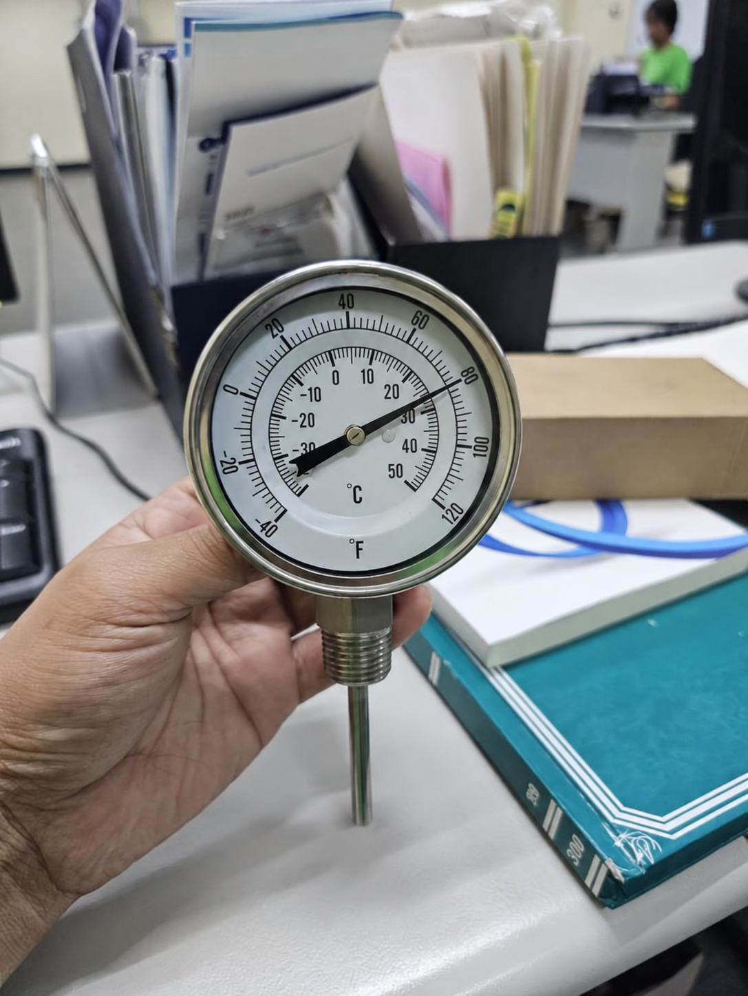 Dial thermometer showing the threaded process connection and sensing stem